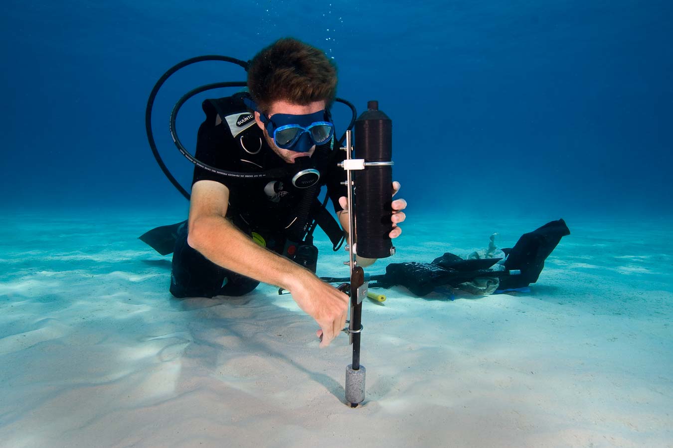 Diver installing an acoustic receiver