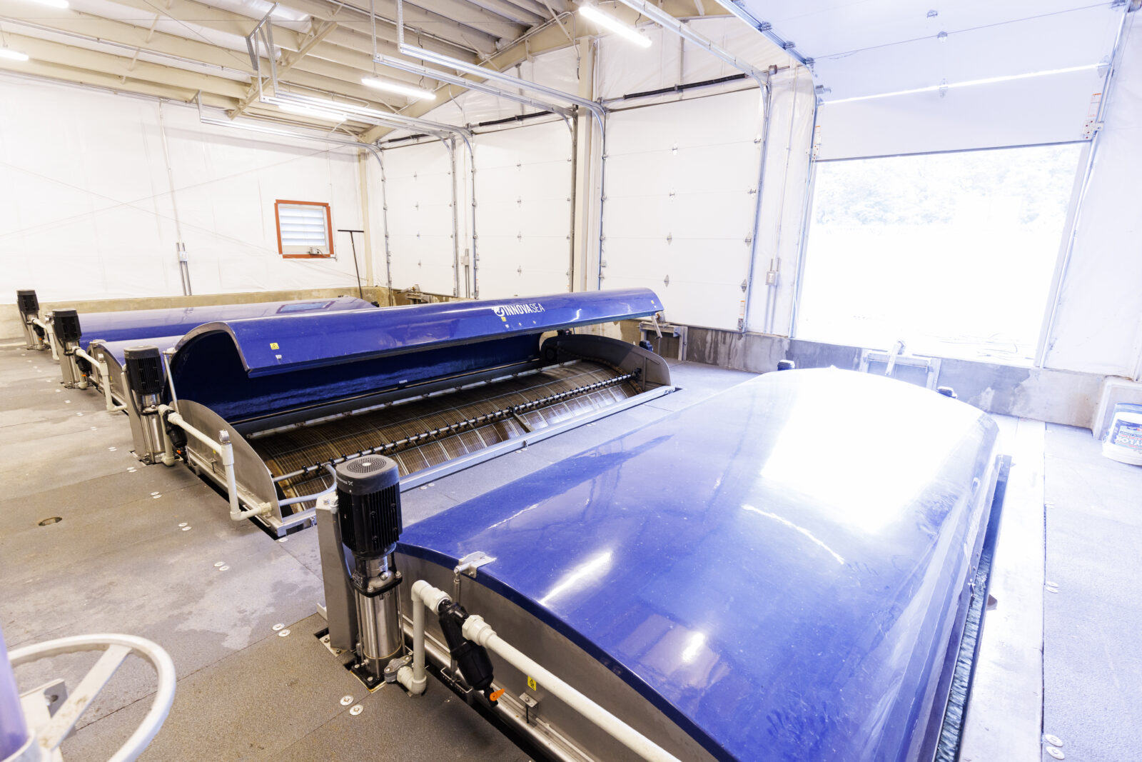 innovasea covered drum filters in an aquaculture facility