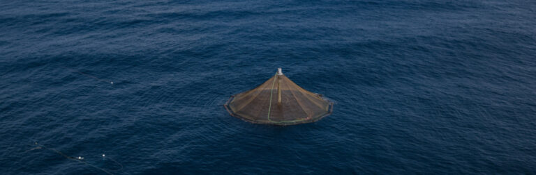 Aerial view of a sea station pen